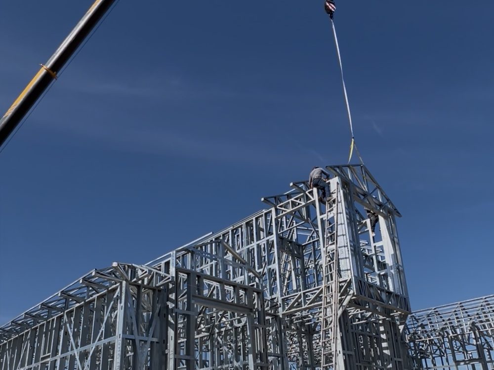 Light gauge steel framing detail on active job site